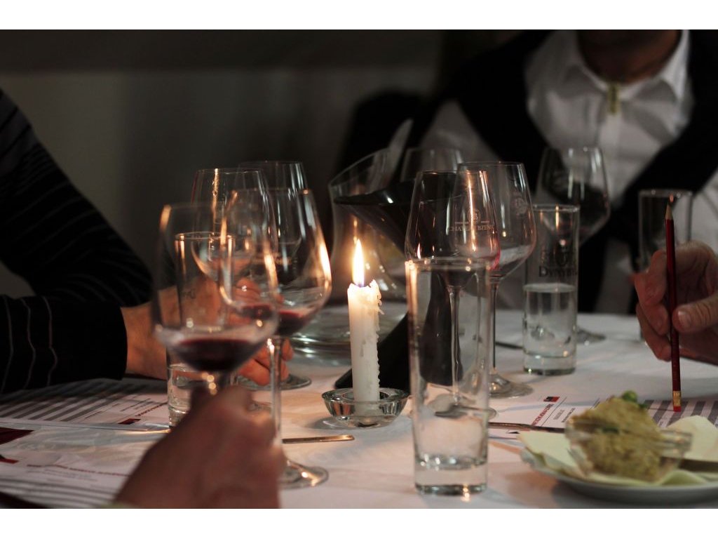 Visitors evaluating the wines